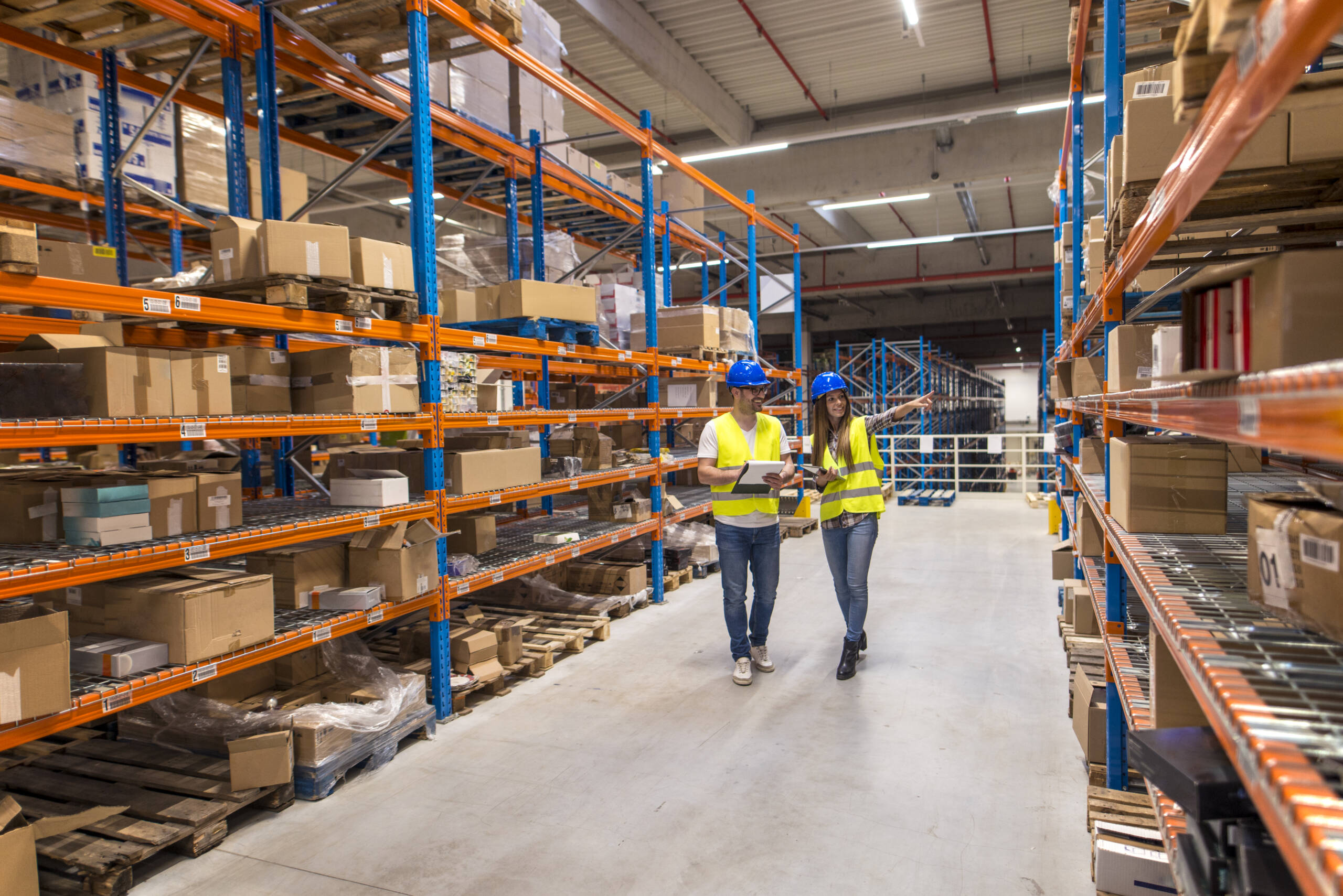 Two caucasian warehouse workers